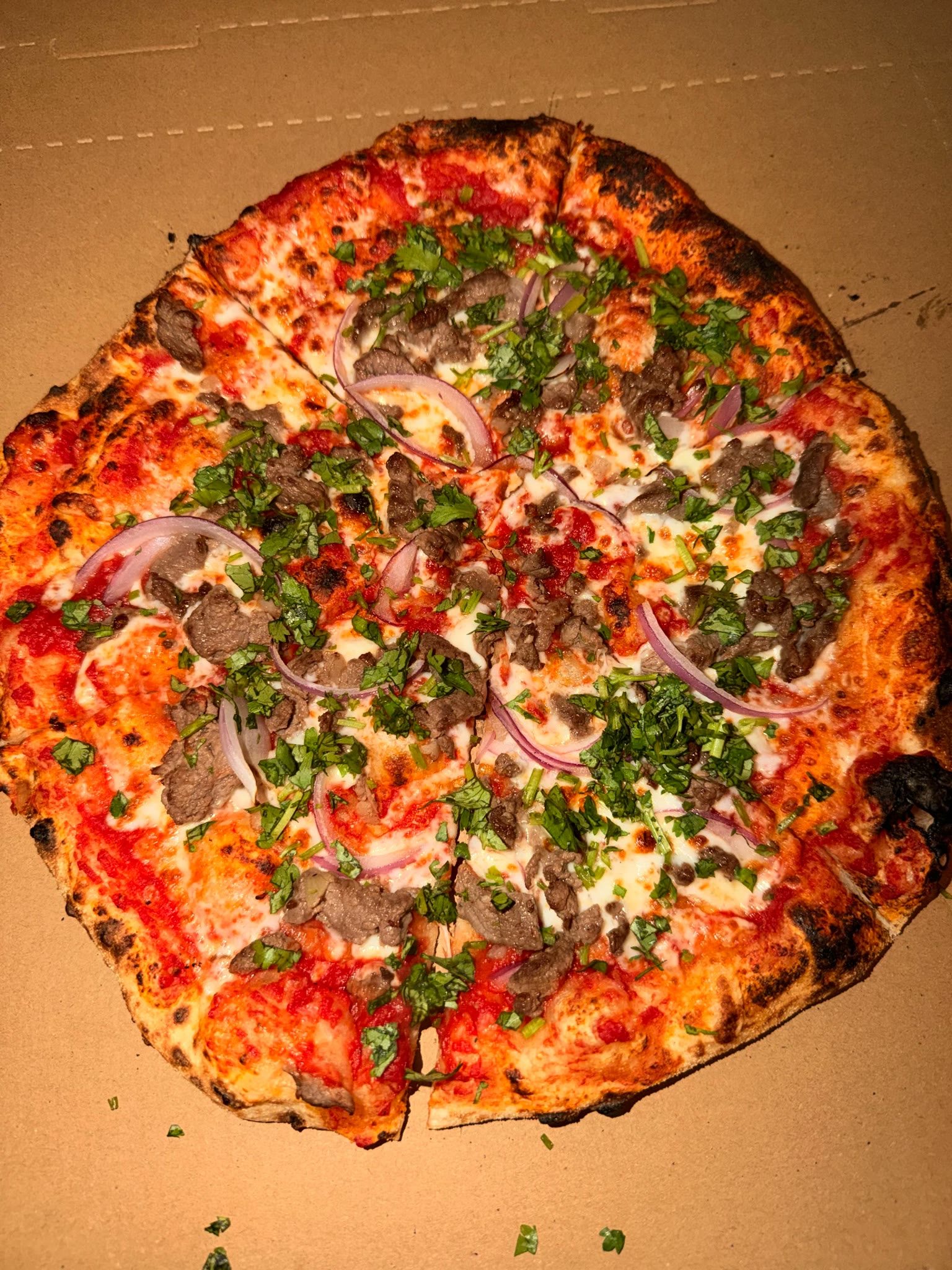 Neapolitan Pizza Stand: Pizza stretched, topped and cooked fresh in front of your guests.